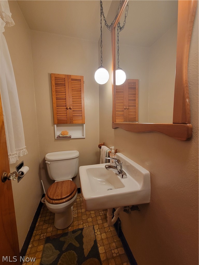 6304 Murray Ridge Road Elyria, OH 44035 - Photo 8 of 34 Half bath near kitchen