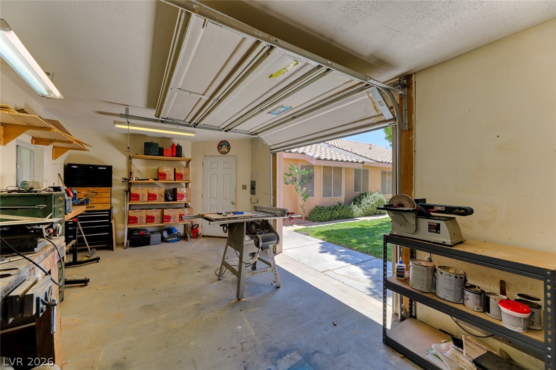2001 Appaloosa Road Henderson, NV 89002 - Photo 8 of 44 This spacious garage offers ample room for storage and projects.