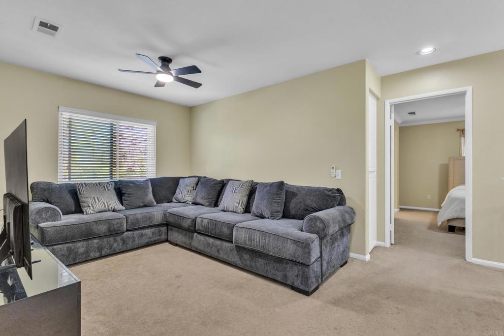 1306 Mill Valley Road Chula Vista, CA 91913 - Photo 16 of 43 a living room with furniture and a large window