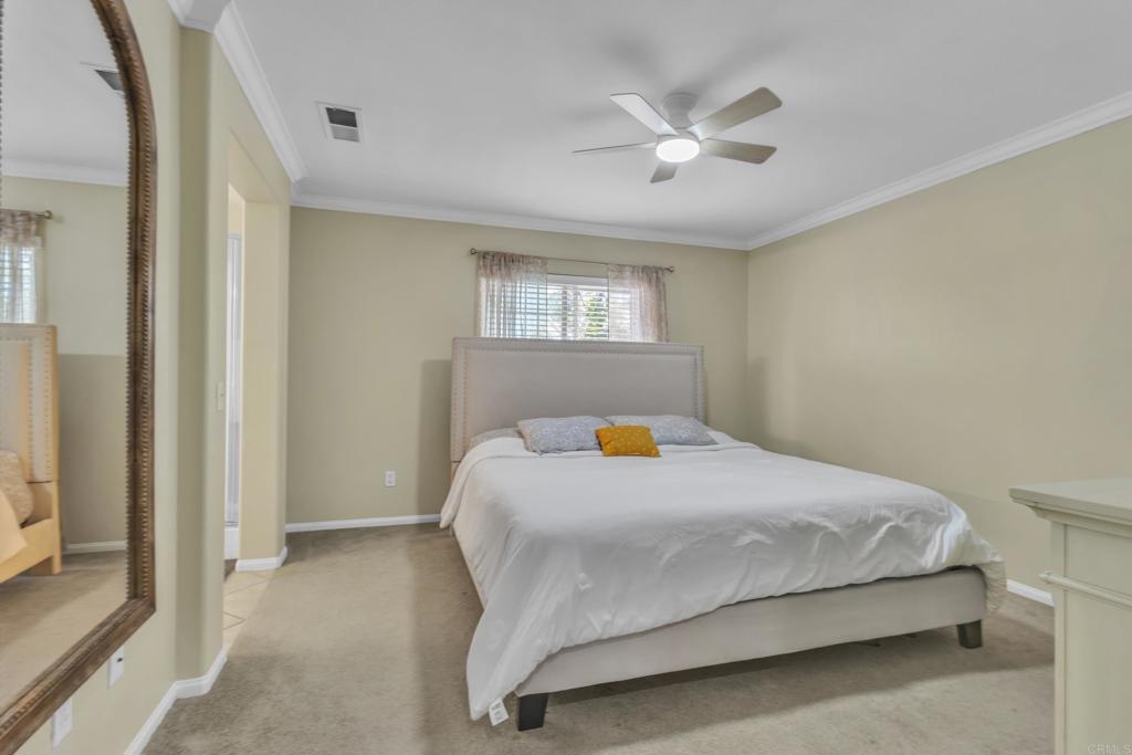 1306 Mill Valley Road Chula Vista, CA 91913 - Photo 18 of 43 a bedroom with a bed and window