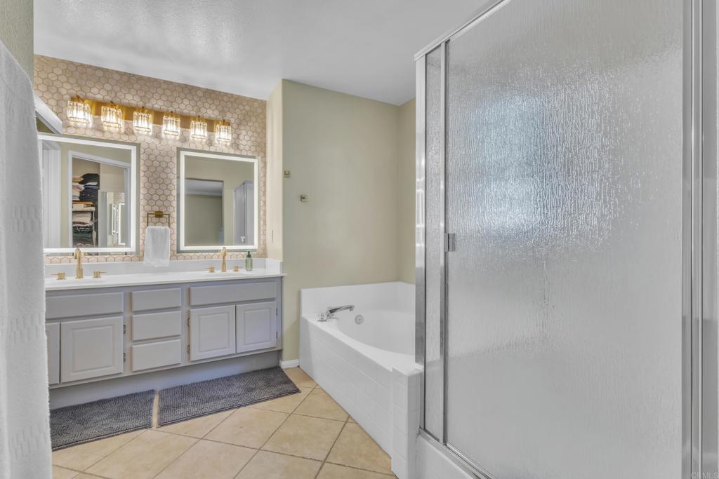 1306 Mill Valley Road Chula Vista, CA 91913 - Photo 20 of 43 a bathroom with a bathtub and a sink