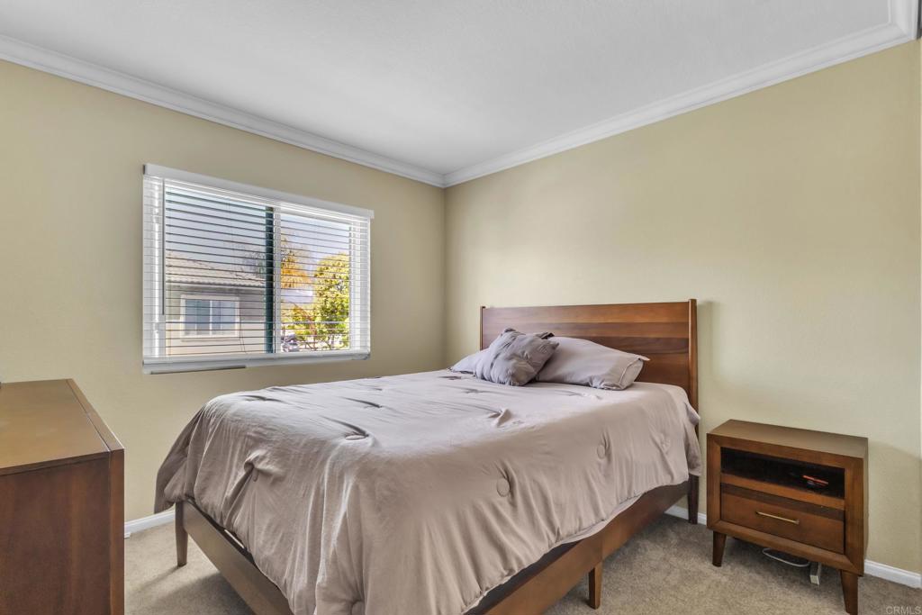 1306 Mill Valley Road Chula Vista, CA 91913 - Photo 26 of 43 a bedroom with a bed and a window