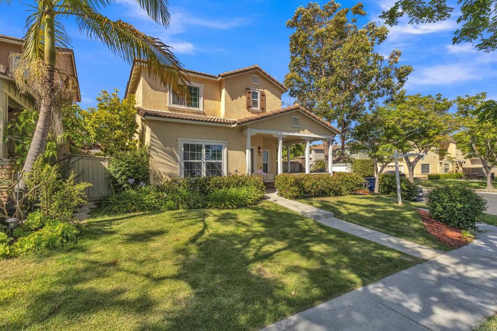 1306 Mill Valley Road Chula Vista, CA 91913 - Photo 3 of 43 a front view of a house with a yard