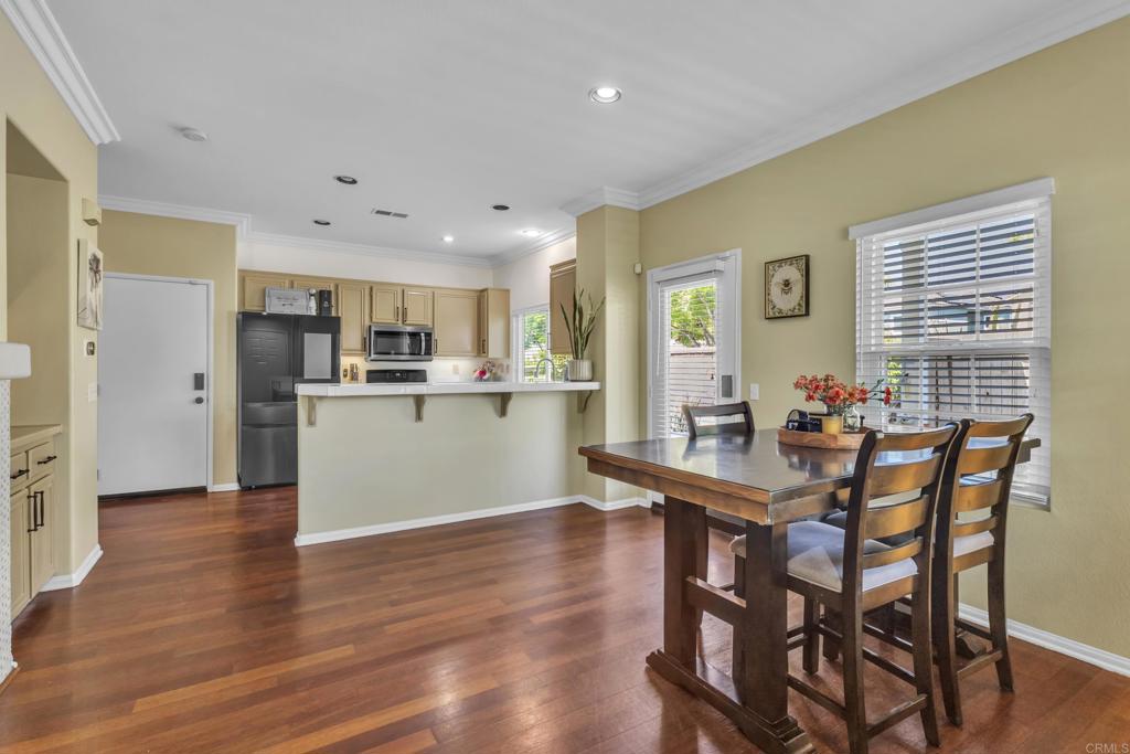 1306 Mill Valley Road Chula Vista, CA 91913 - Photo 9 of 43 a view of a dining room with furniture and wooden floor