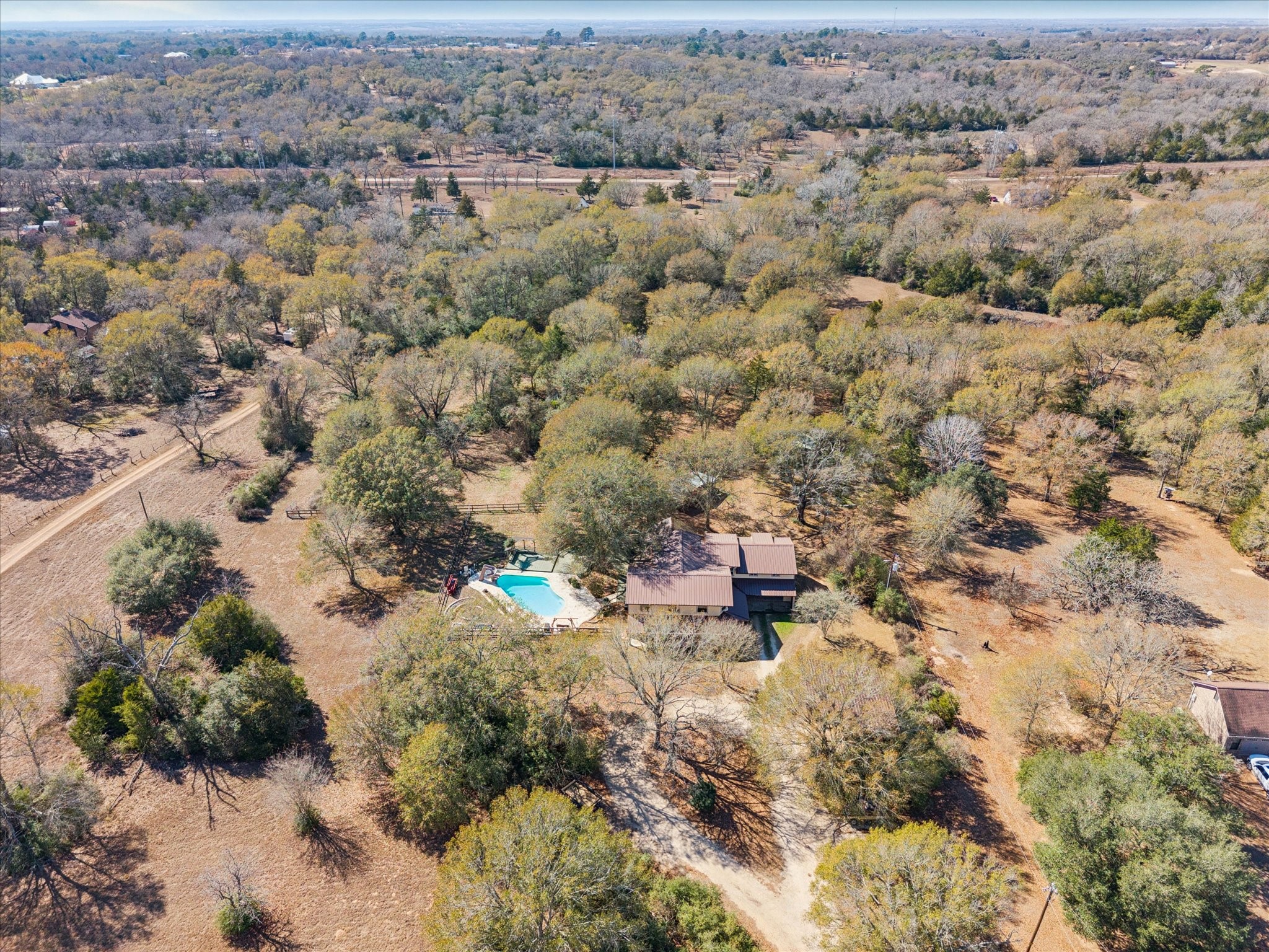 640 Piney Creek Road Bellville, TX 77418 - Photo 31 of 35 an aerial view of house with yard and mountain view