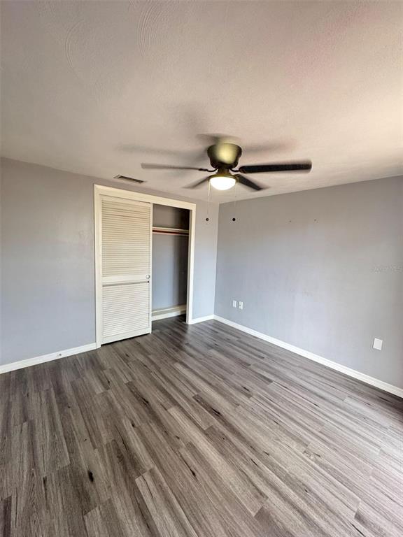 4025 Grayton Drive New Port Richey, FL 34652 - Photo 16 of 33 a view of an empty room and wooden floor