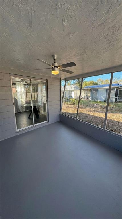 4025 Grayton Drive New Port Richey, FL 34652 - Photo 26 of 33 wooden floor in an empty room with a window