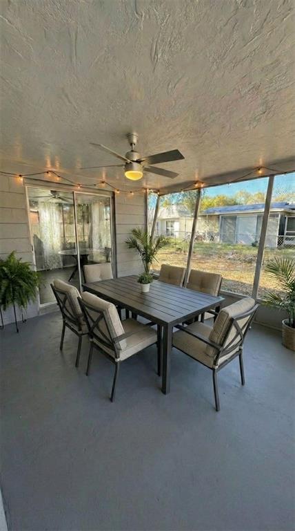 4025 Grayton Drive New Port Richey, FL 34652 - Photo 27 of 33 a living room with furniture and a table