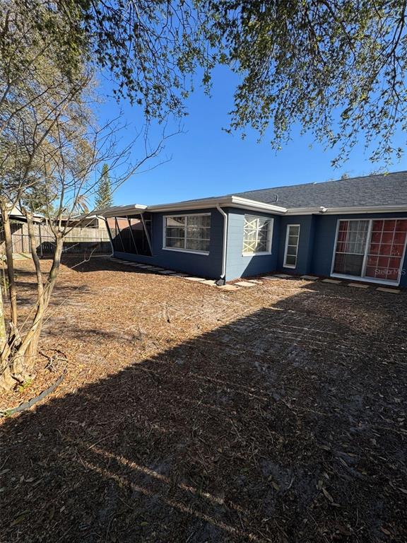 4025 Grayton Drive New Port Richey, FL 34652 - Photo 33 of 33 a view of a house with backyard and sitting area