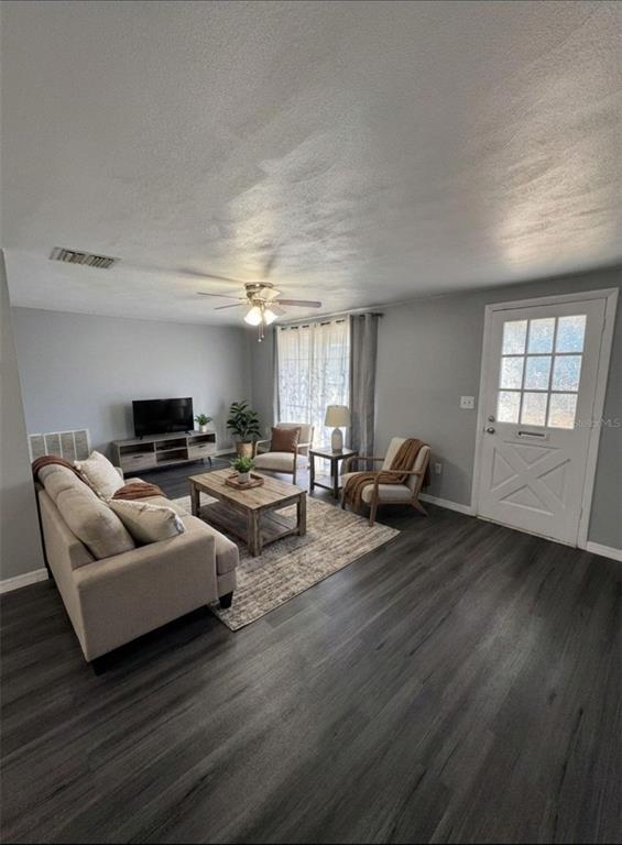 4025 Grayton Drive New Port Richey, FL 34652 - Photo 4 of 33 a living room with furniture and wooden floor