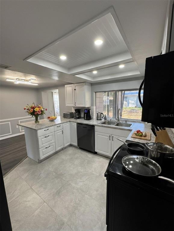 4025 Grayton Drive New Port Richey, FL 34652 - Photo 10 of 33 a kitchen that has a sink and a stove
