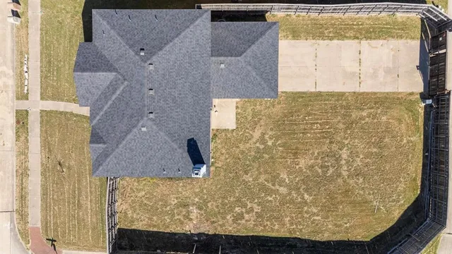 a terrace with outdoor seating and city view