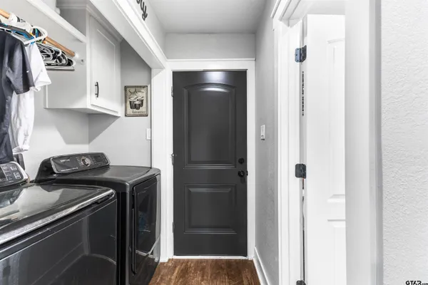a kitchen with stainless steel appliances granite countertop a stove and a refrigerator
