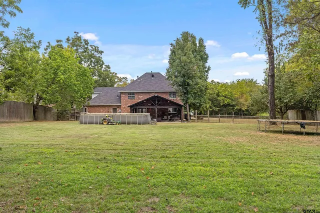a house view with a outdoor space