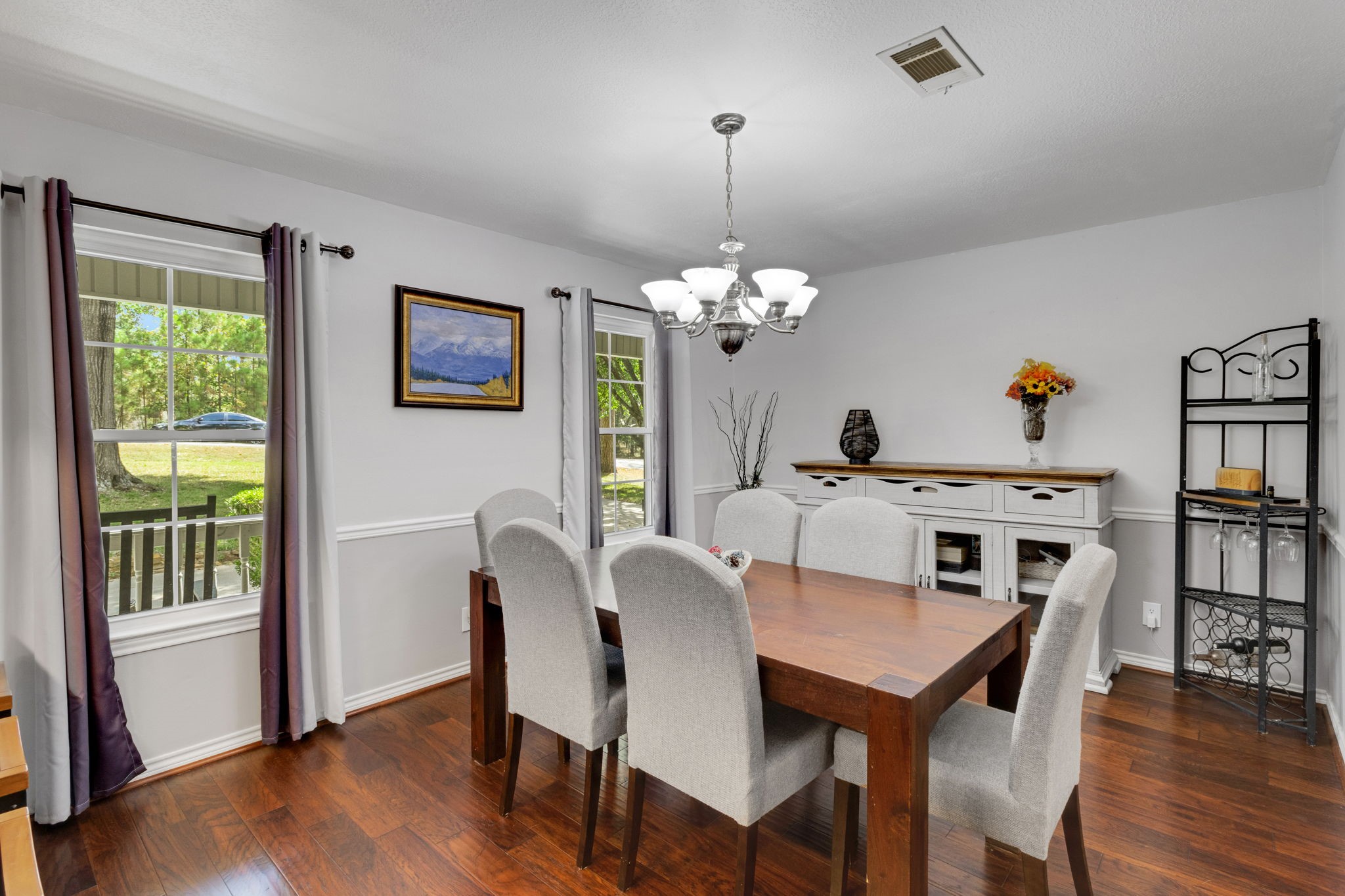 80 Lake Grove Drive Coldspring, TX 77331 - Photo 13 of 50 a view of a dining room with furniture window and wooden floor