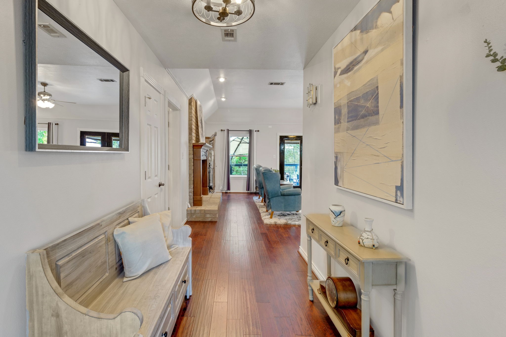 80 Lake Grove Drive Coldspring, TX 77331 - Photo 3 of 50 a hallway with furniture and wooden floor