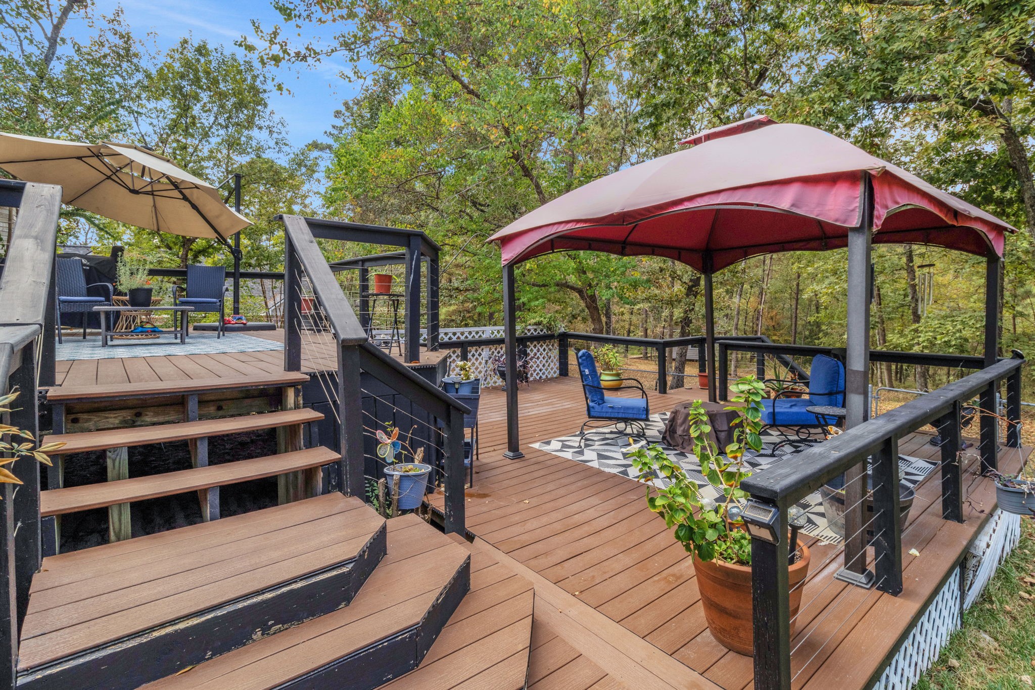 80 Lake Grove Drive Coldspring, TX 77331 - Photo 34 of 50 a view of a house with backyard and sitting area