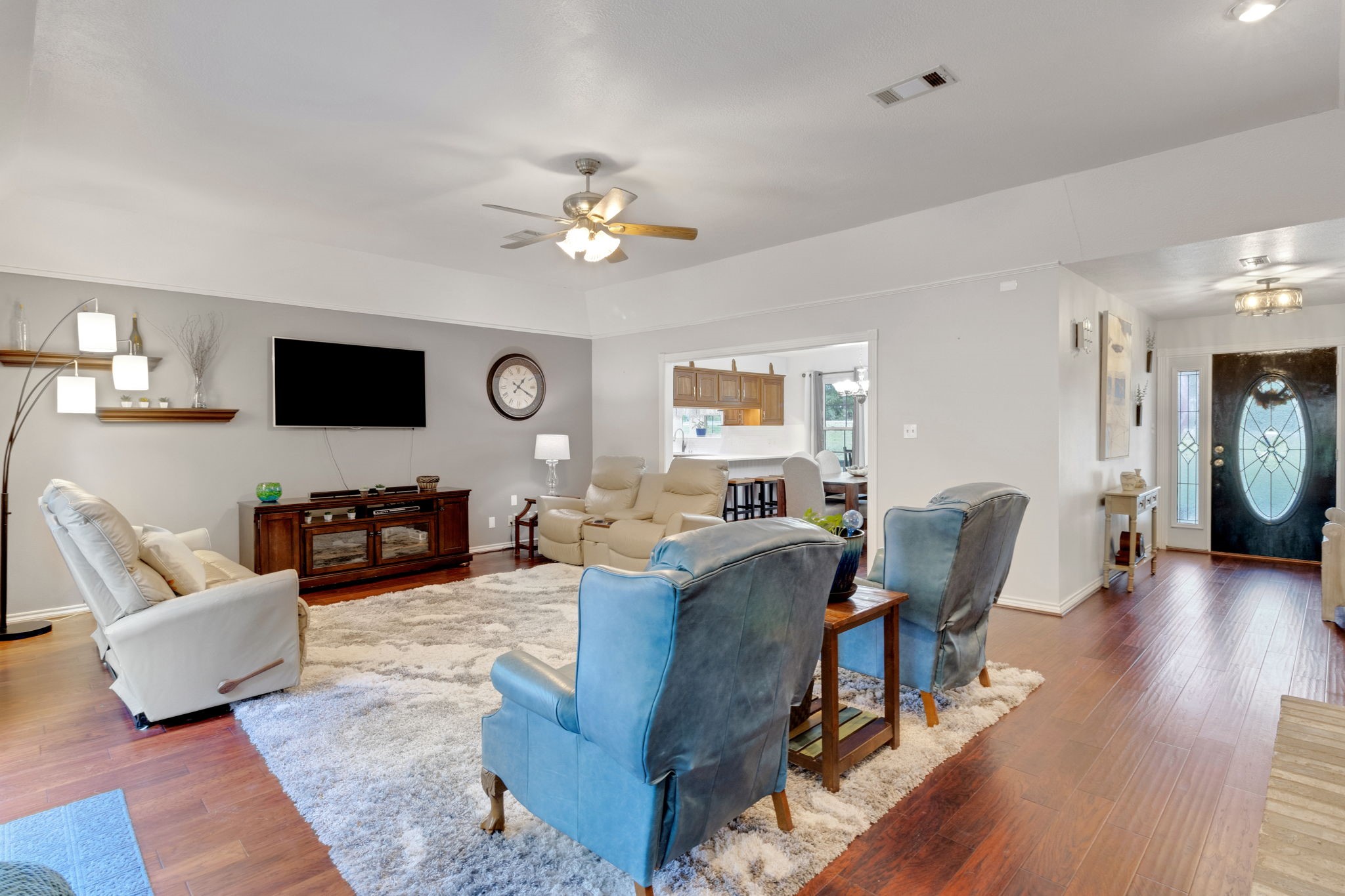 80 Lake Grove Drive Coldspring, TX 77331 - Photo 4 of 50 a living room with fireplace furniture and a flat screen tv