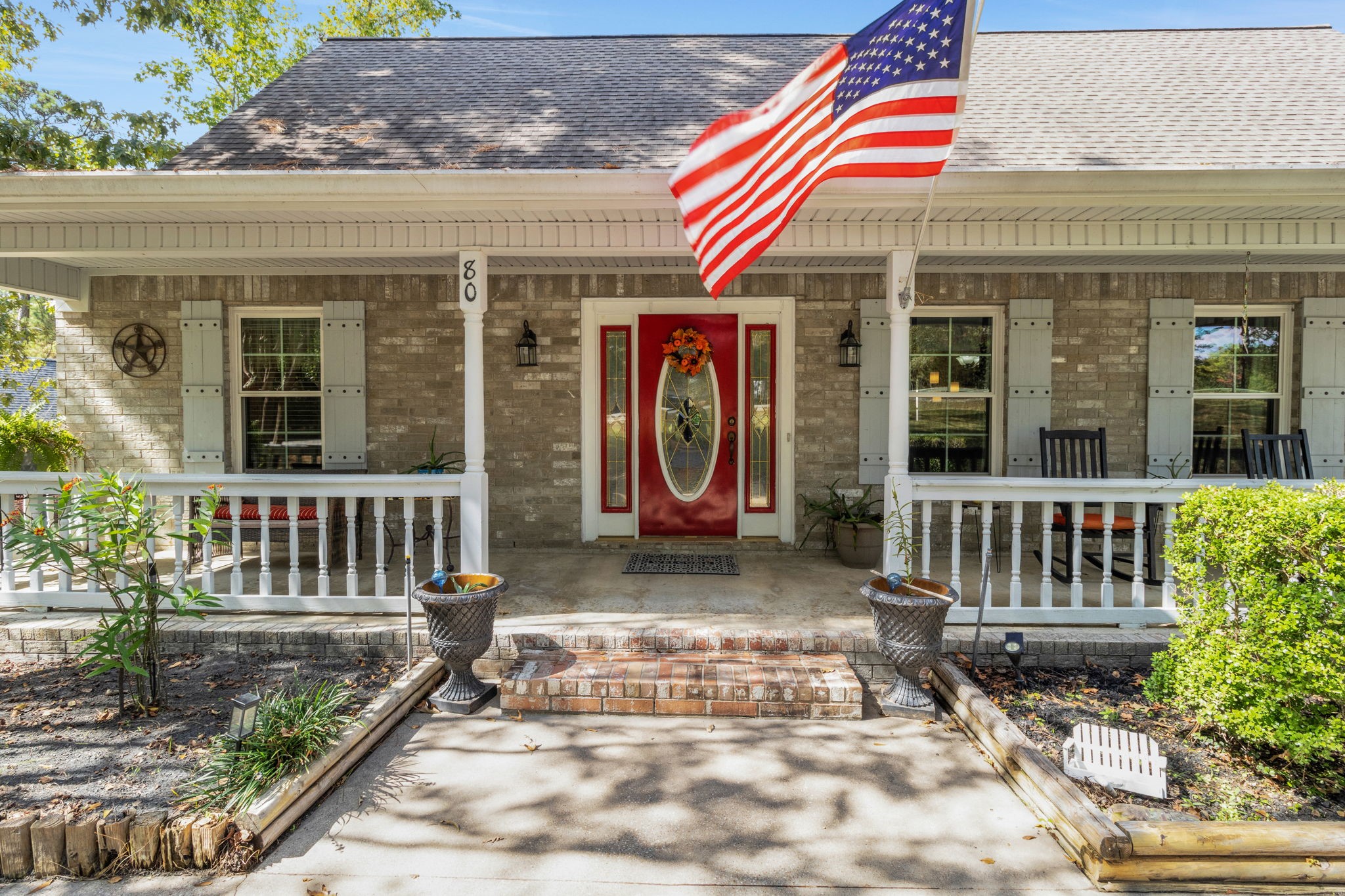 80 Lake Grove Drive Coldspring, TX 77331 - Photo 41 of 50 a view of a house with entrance gate