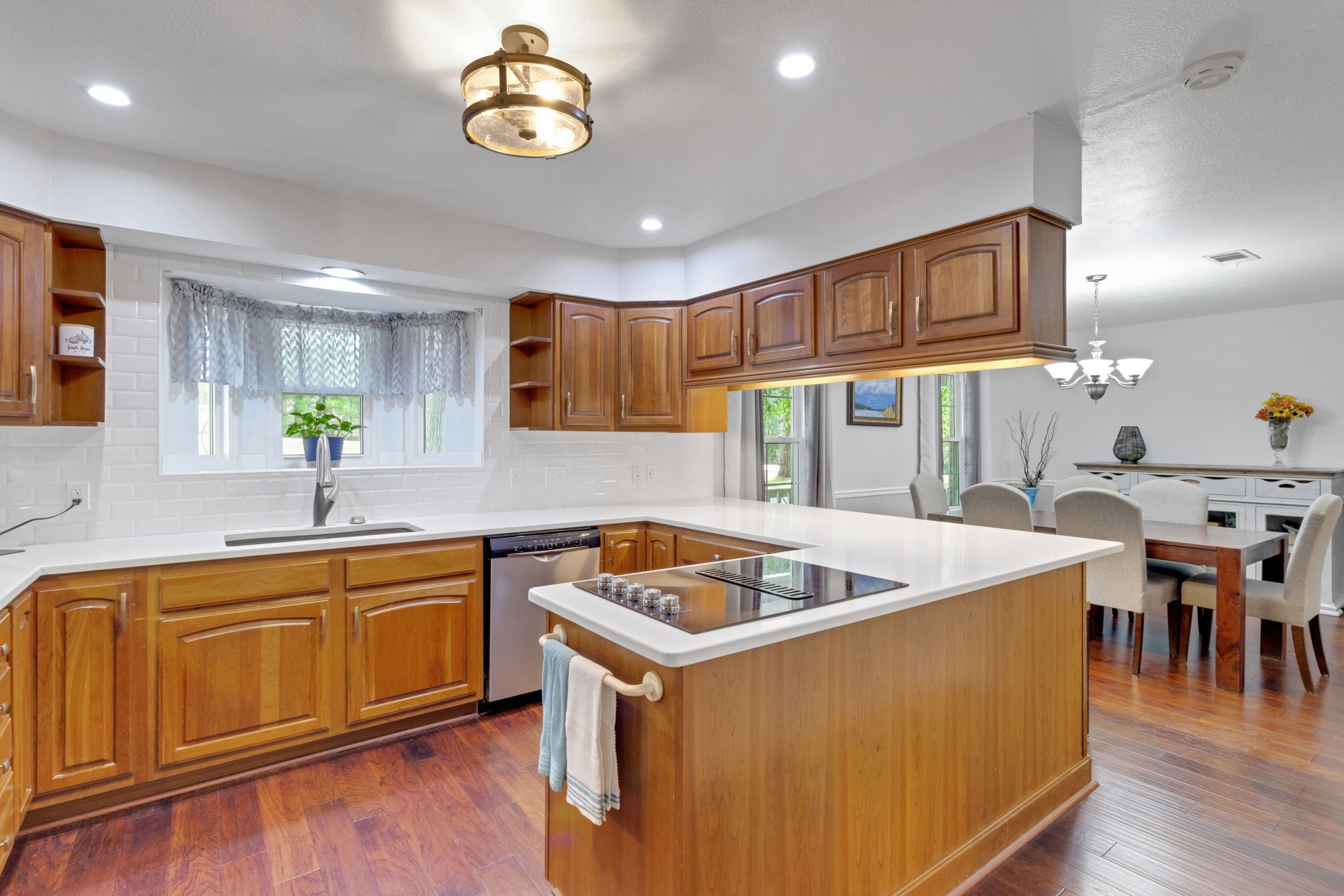 80 Lake Grove Drive Coldspring, TX 77331 - Photo 9 of 50 a kitchen that has a sink and a stove in it