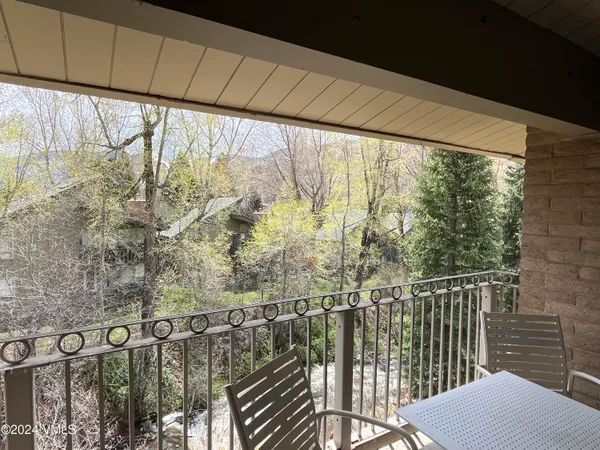 a view of a balcony with an outdoor space