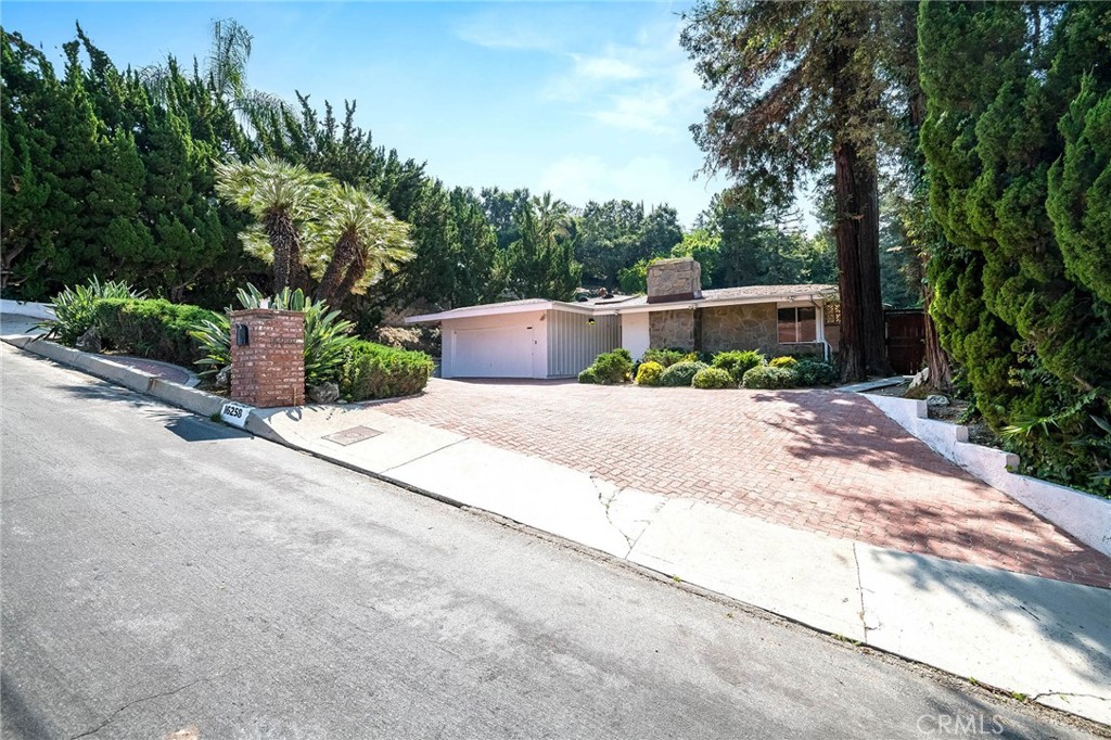 16258 Bertella Drive Encino, CA 91436 - Photo 1 of 45 a view of a house with a outdoor space
