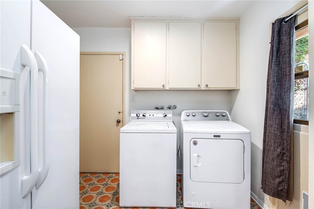 16258 Bertella Drive Encino, CA 91436 - Photo 19 of 45 a view of storage and utility room with washer and dryer