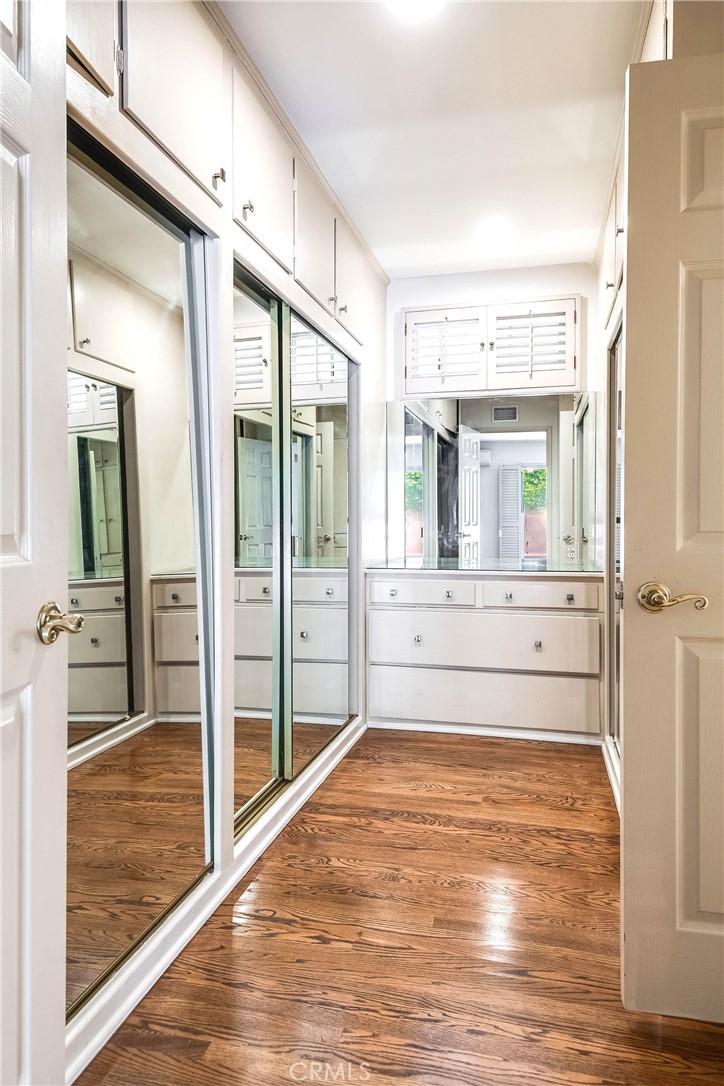 16258 Bertella Drive Encino, CA 91436 - Photo 28 of 45 a view of a bathroom with a tub mirror and windows
