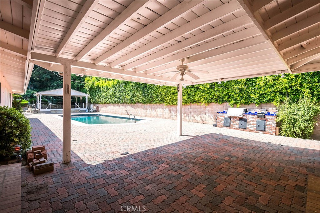 16258 Bertella Drive Encino, CA 91436 - Photo 31 of 45 a view of a backyard with porch