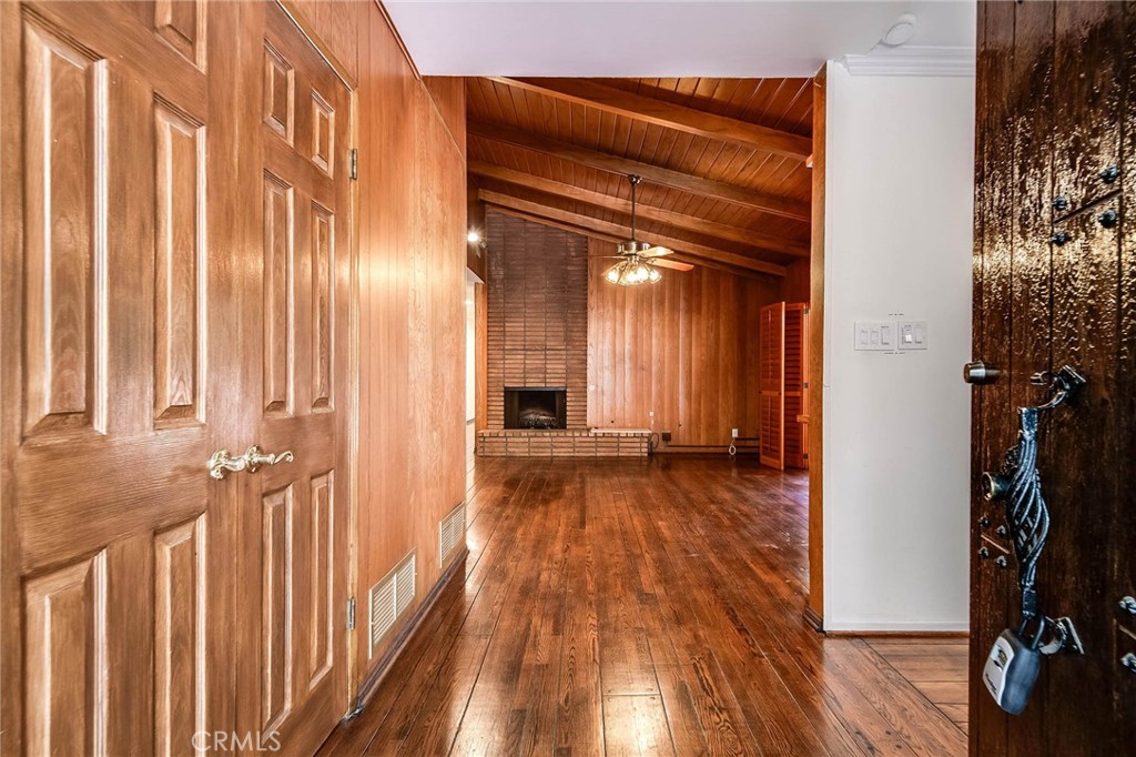 16258 Bertella Drive Encino, CA 91436 - Photo 7 of 45 a view of a room with wooden floor and walls