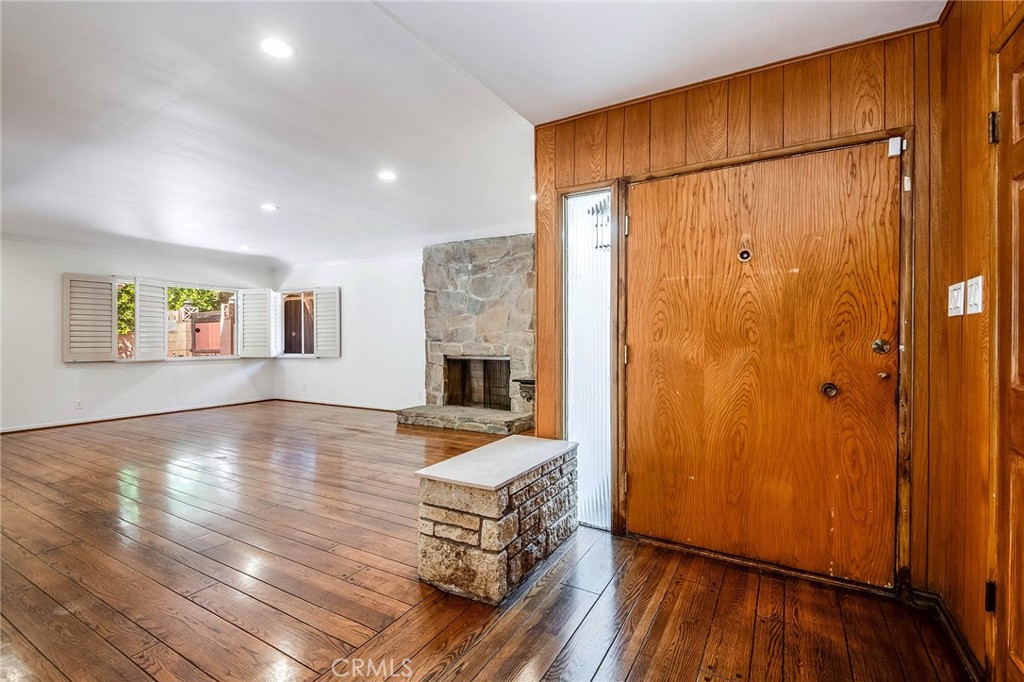 16258 Bertella Drive Encino, CA 91436 - Photo 8 of 45 a view of livingroom with furniture wooden floor and front door