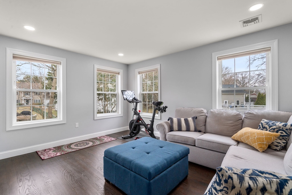 6 Ash Street Natick, MA 01760 - Photo 15 of 39 a living room with furniture and a window