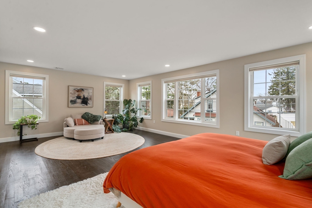 6 Ash Street Natick, MA 01760 - Photo 20 of 39 a bedroom with a large bed and a large window