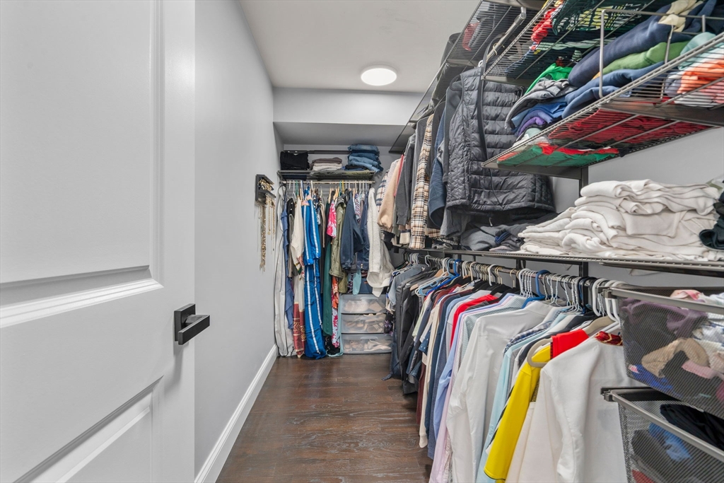 6 Ash Street Natick, MA 01760 - Photo 24 of 39 a view of walk in closet with clothes and shoes