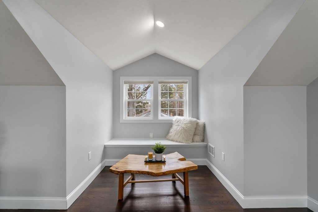 6 Ash Street Natick, MA 01760 - Photo 29 of 39 a living room with furniture and a window