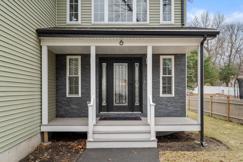 6 Ash Street Natick, MA 01760 - Photo 35 of 39 a view of a entryway door front of the house