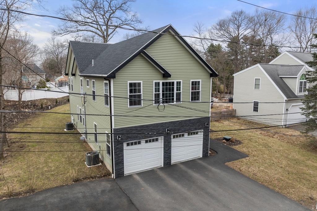 6 Ash Street Natick, MA 01760 - Photo 37 of 39 a view of house with a yard