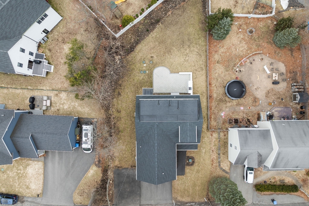 6 Ash Street Natick, MA 01760 - Photo 39 of 39 an aerial view of a fireplace with wooden floor
