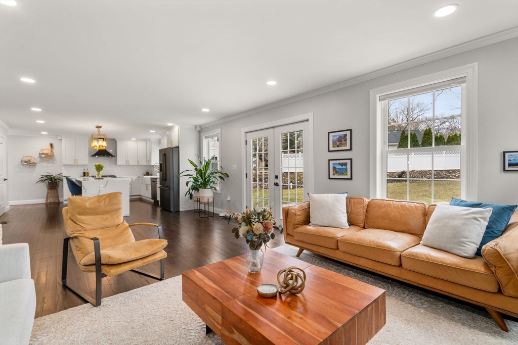 6 Ash Street Natick, MA 01760 - Photo 6 of 39 a living room with furniture and a large window