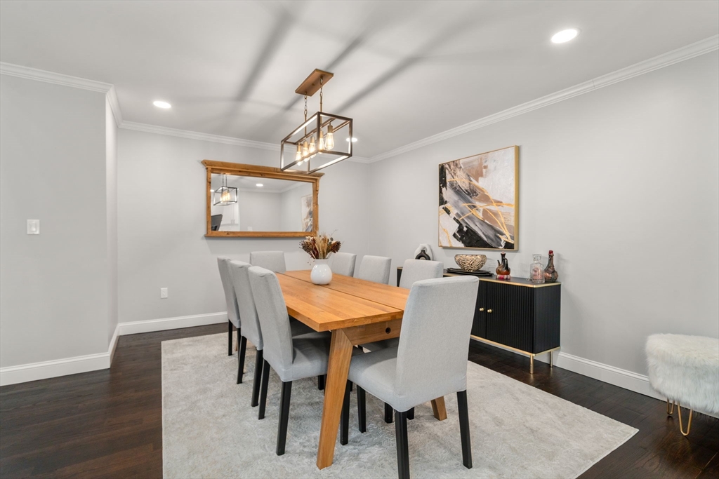 6 Ash Street Natick, MA 01760 - Photo 10 of 39 a view of a dining room with furniture and wooden floor