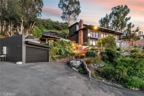 a view of a balcony with an ocean view