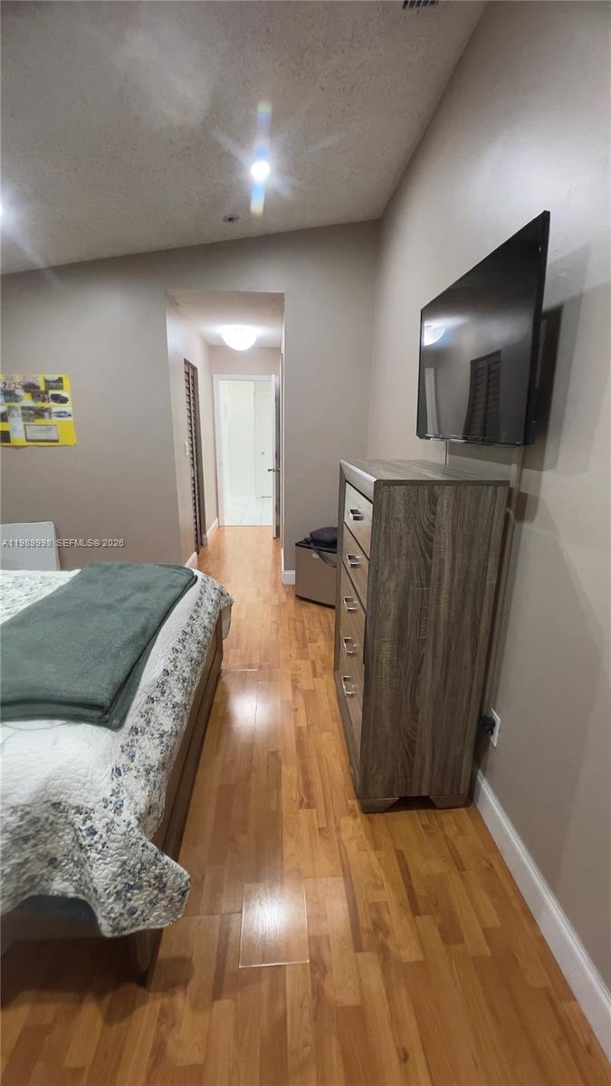 14252 Southwest 175th Terrace Miami, FL 33177 - Photo 34 of 39 a view of a livingroom with furniture and a flat screen tv