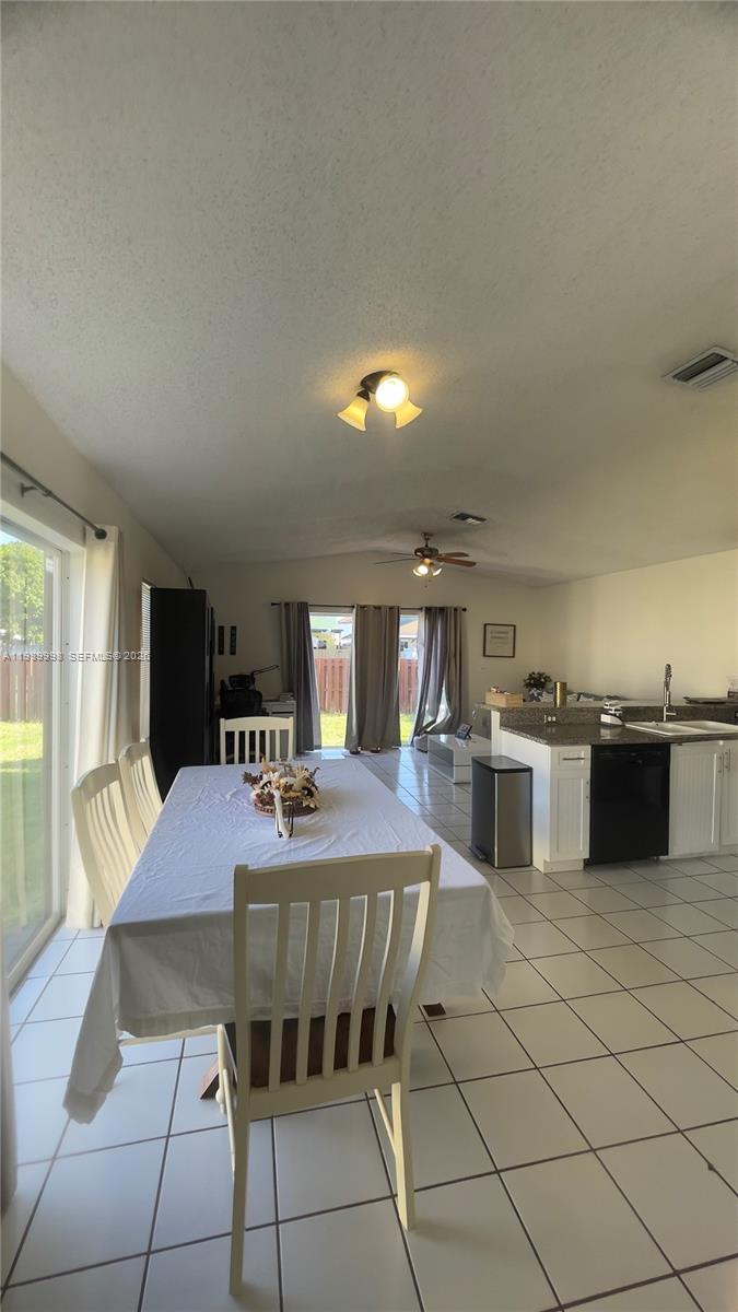 14252 Southwest 175th Terrace Miami, FL 33177 - Photo 38 of 39 a view of a dining room with furniture