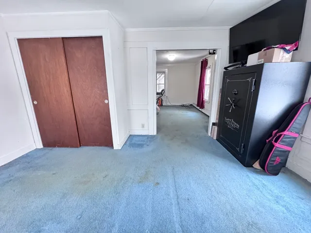 a view of balcony with wooden floor and outdoor seating