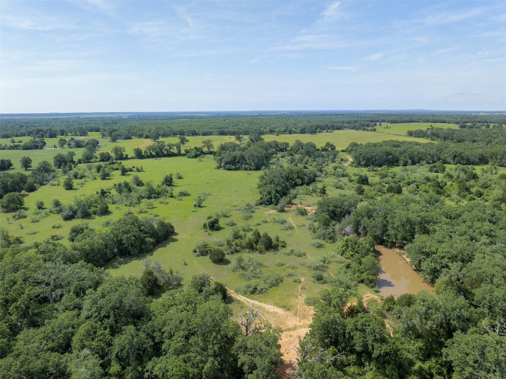 459 County Road 459 Road Thorndale, TX 76577 - Photo 26 of 35 an aerial view of a houses with trees