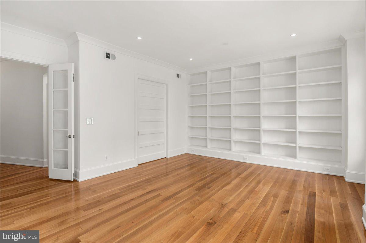2006 Columbia Road Northwest, Unit 5 Washington, DC 20009 - Photo 19 of 41 Living room w/ TV/bar niche behind pocket door