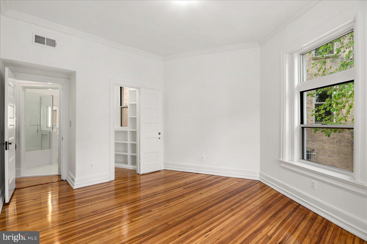 2006 Columbia Road Northwest, Unit 5 Washington, DC 20009 - Photo 24 of 41 Large primary bedroom with walk-in closet