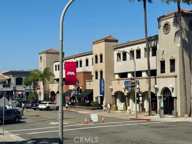 a bedroom with a bed and a ceiling fan