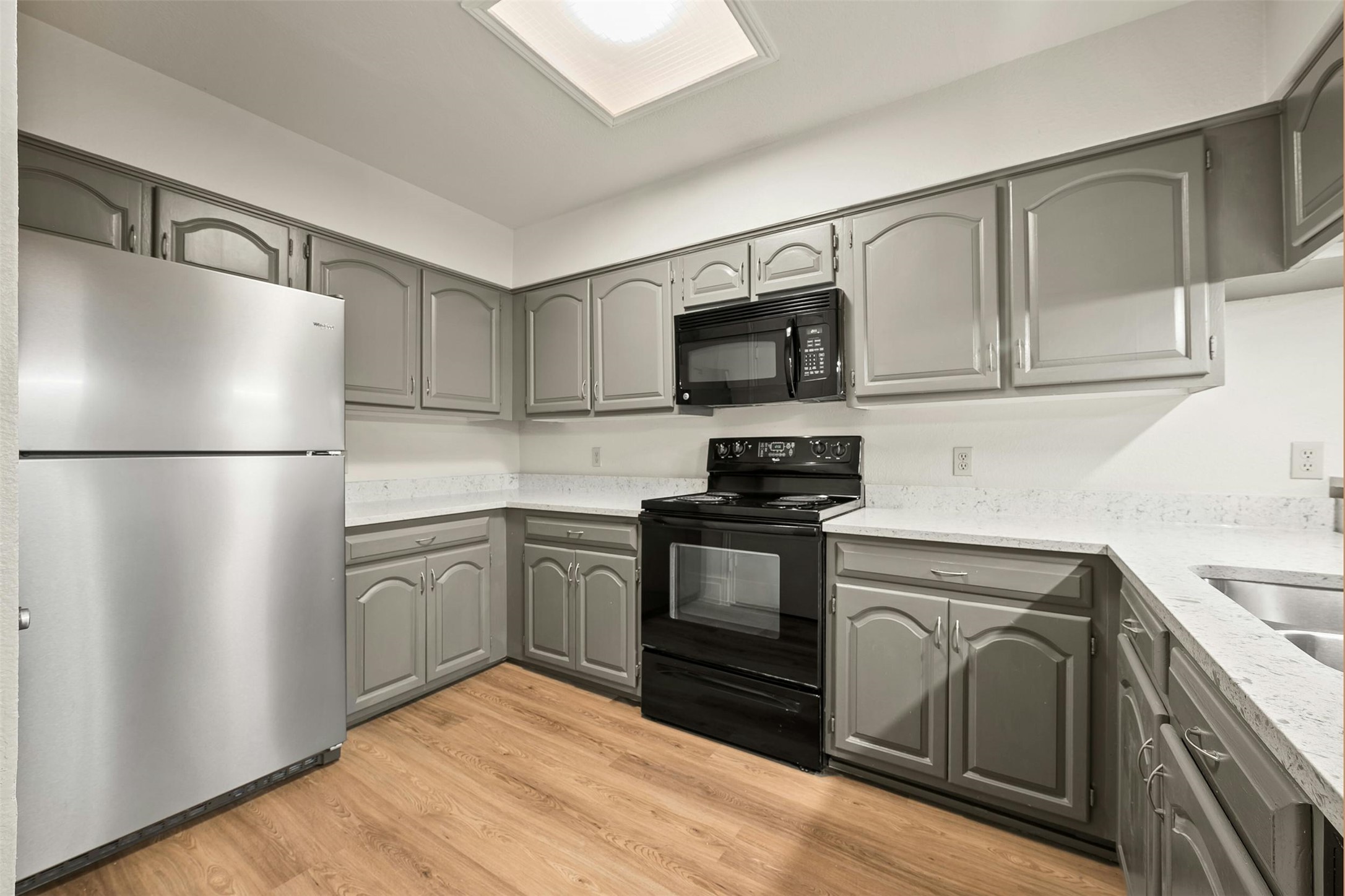 1910 Robbins Place, Unit 105 Austin, TX 78705 - Photo 14 of 30 Wide kitchen view with generous cabinetry