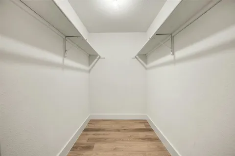 a view of a room with racks on the wall